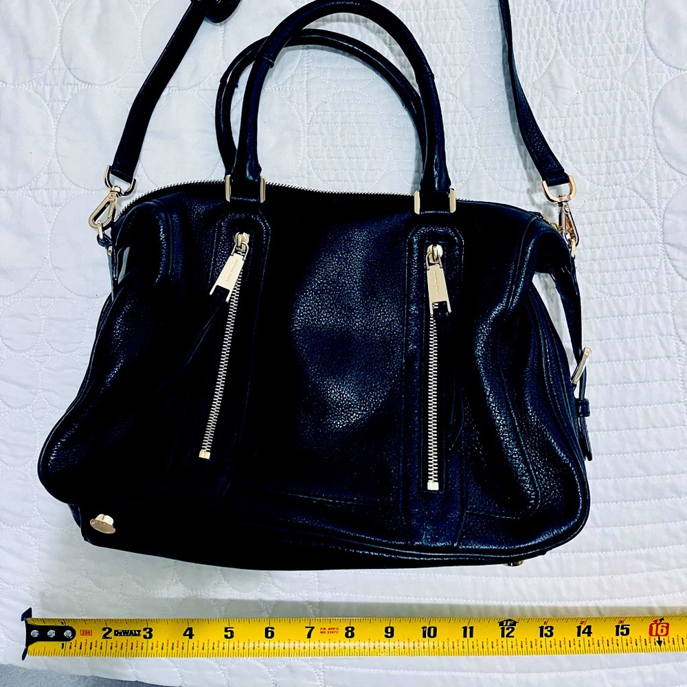 Michael Kors black leather with gold accents.